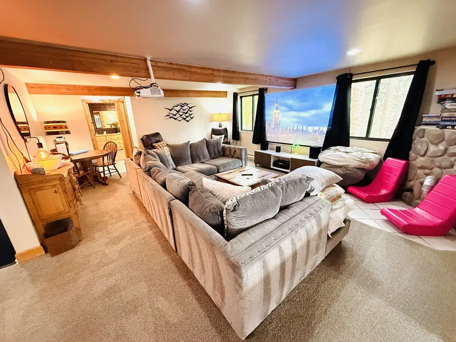 Living room with mountain-view windows