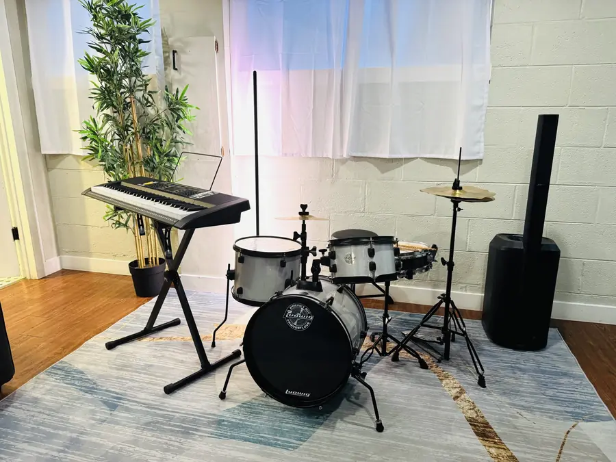 Music room with drums and keyboard