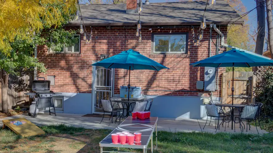 Back patio with umbrellas