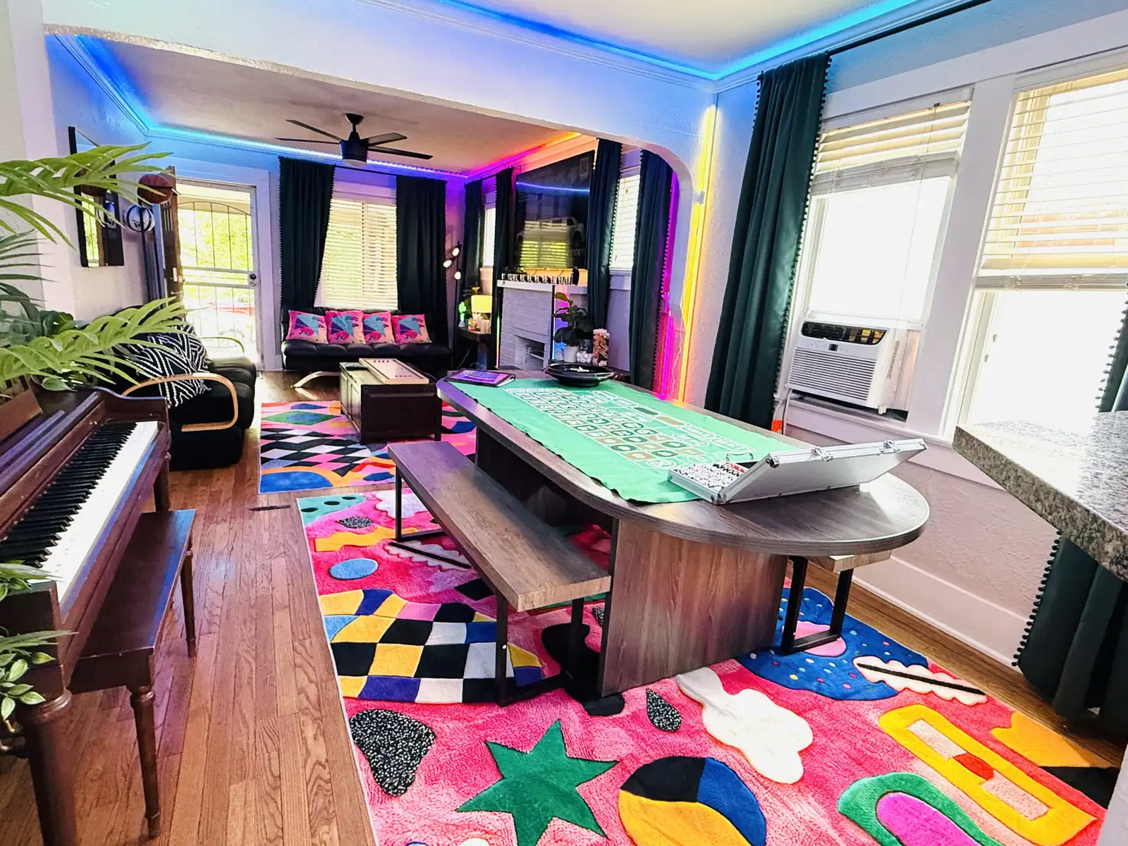 Vibe City RiNo Escape colorful living and game room